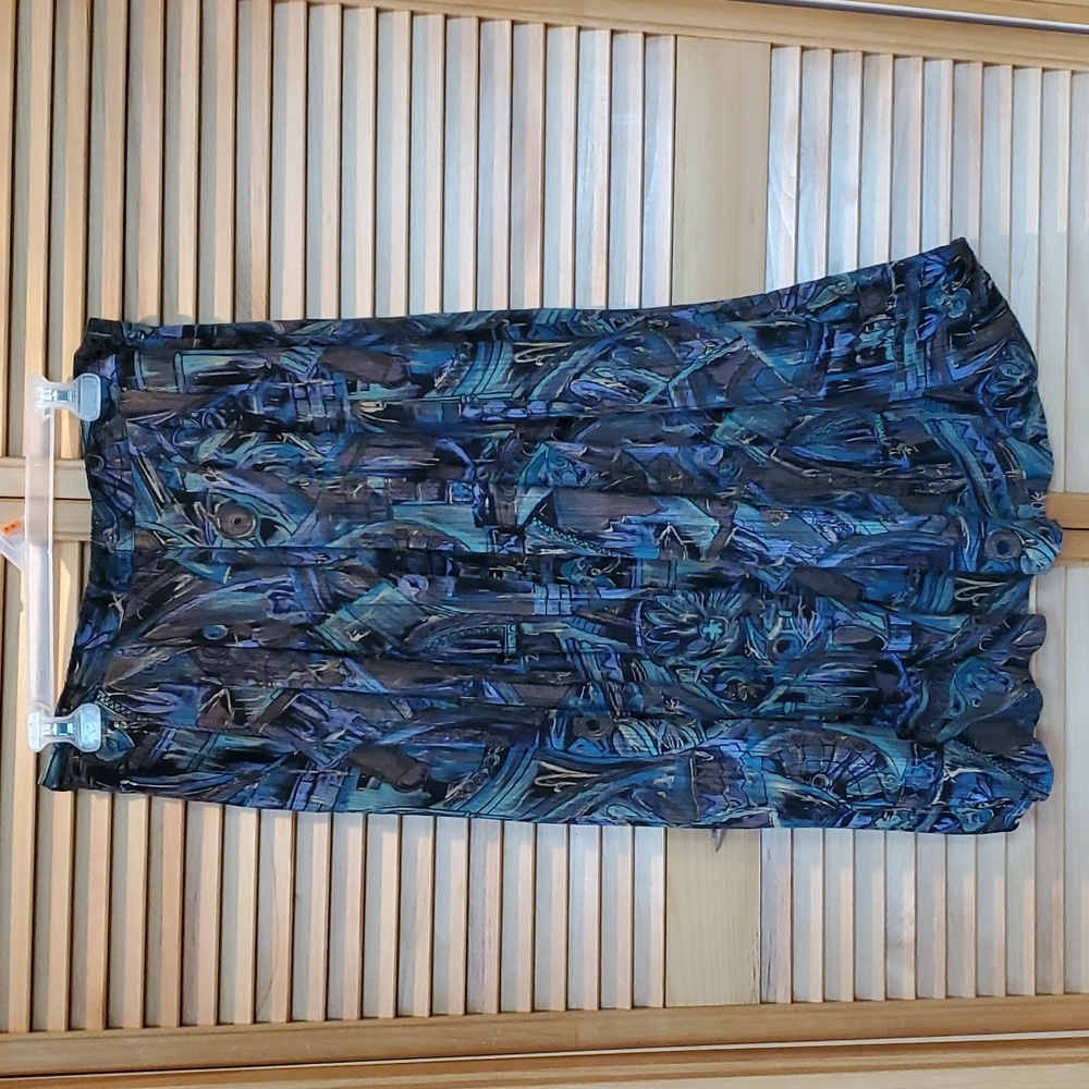 Dramatic geometric long flair skirt